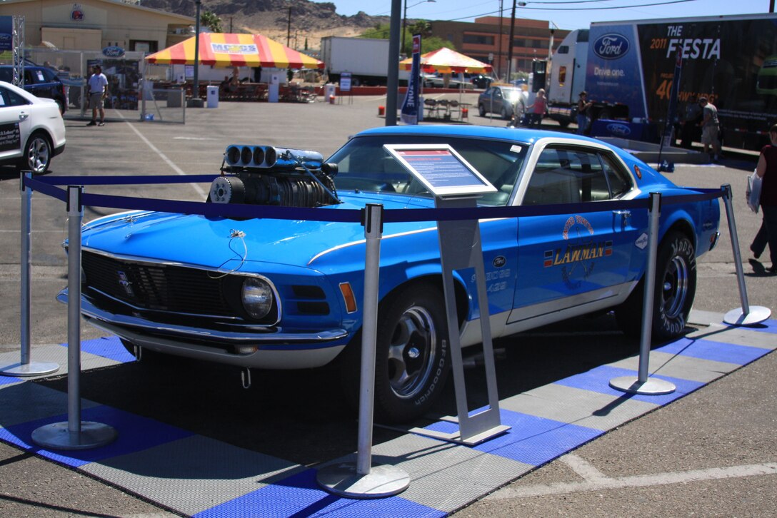 Former wrestling champion and actor Bill Goldberg's 1970 Ford Lawman "Super Boss" 429 Mustang gleams in the sunlight at the Ford: Operation Drive One event June 4. Goldberg was present at the event as his personal way of saying "thank you" to nation's military and their families for the sacrifices they make.